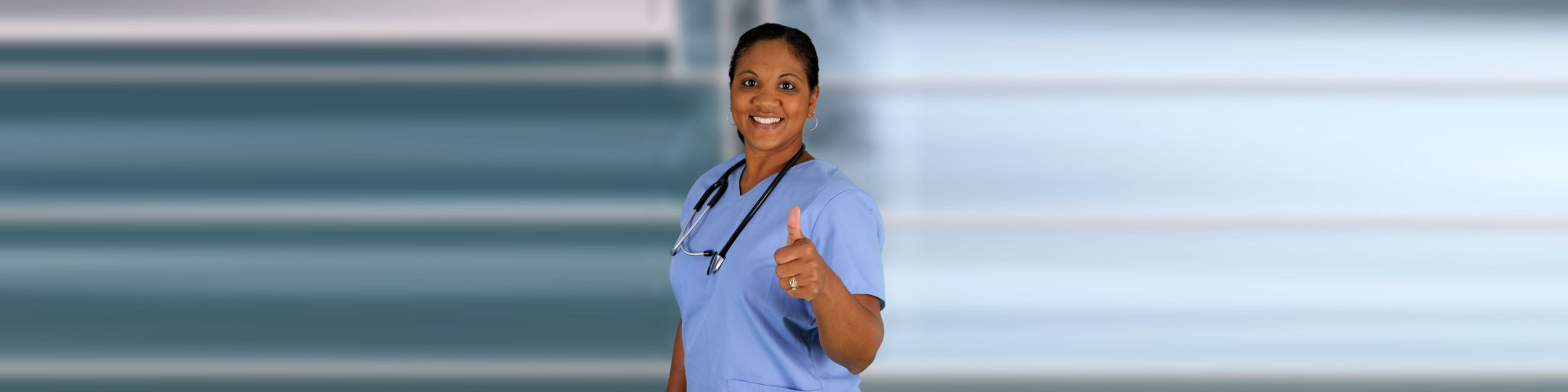 Minority nurse working at her job in a hospital